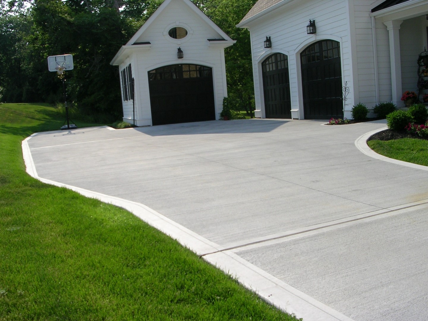 Freshly poured concrete driveway at residential home